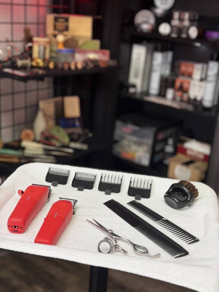 Professional haircutting tools prepared for a client